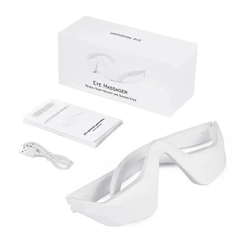 Wireless eye massager with red light and heat therapy for eye strain relief and improved circulation.