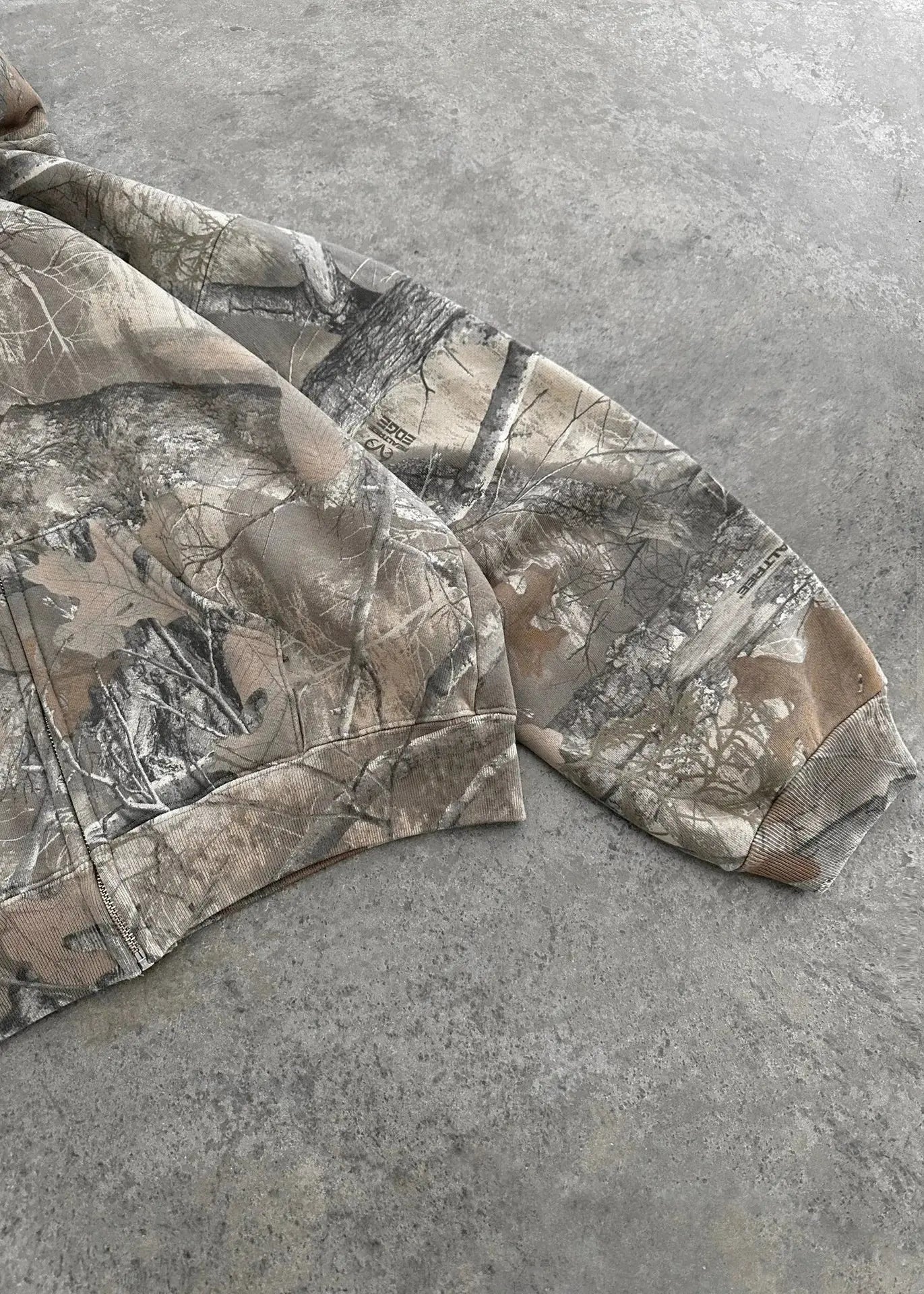 Unisex oversized urban camo hoodie with adjustable hood and retro streetwear style